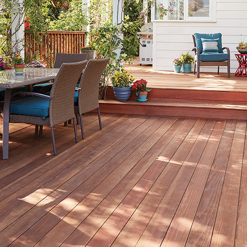 Outdoor setting on a brown stained deck